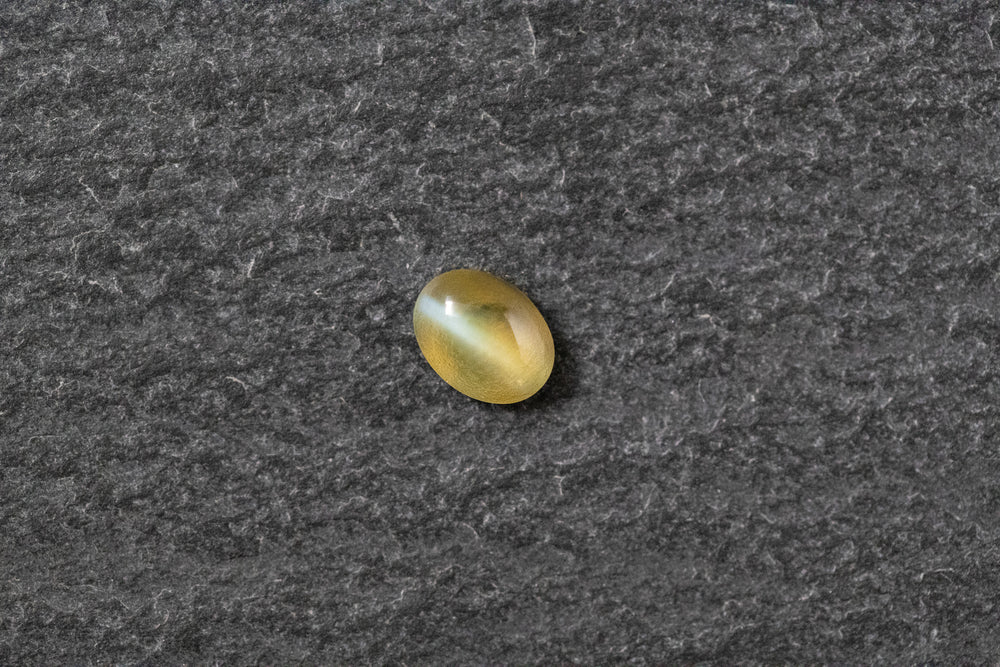 Beryll Katzenauge, oval, cabochon, gelb