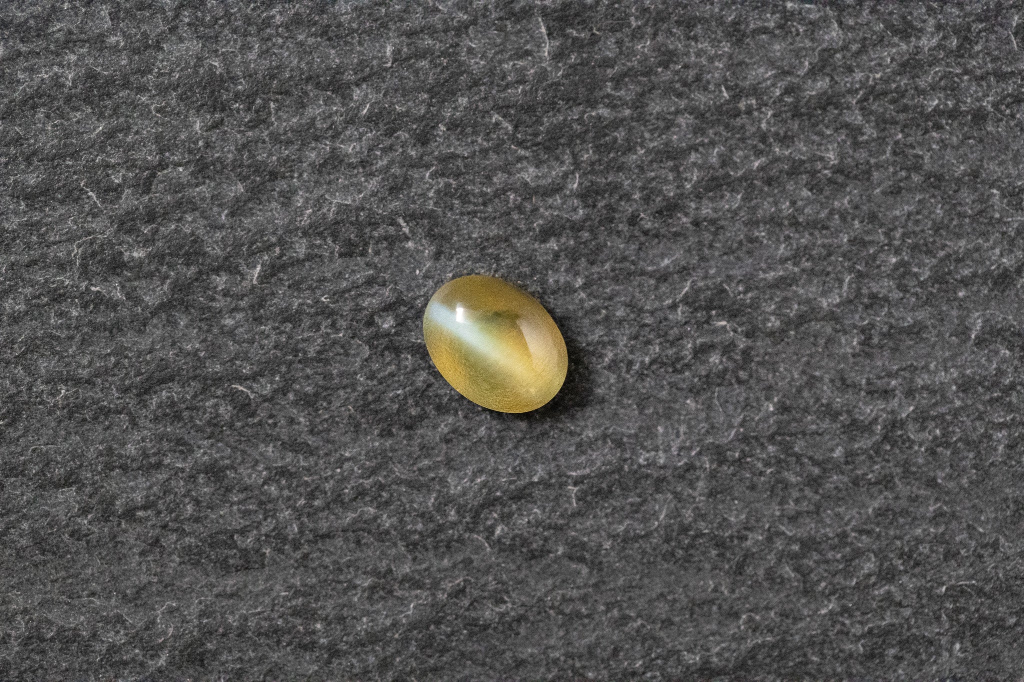 Beryll Katzenauge, oval, cabochon, gelb