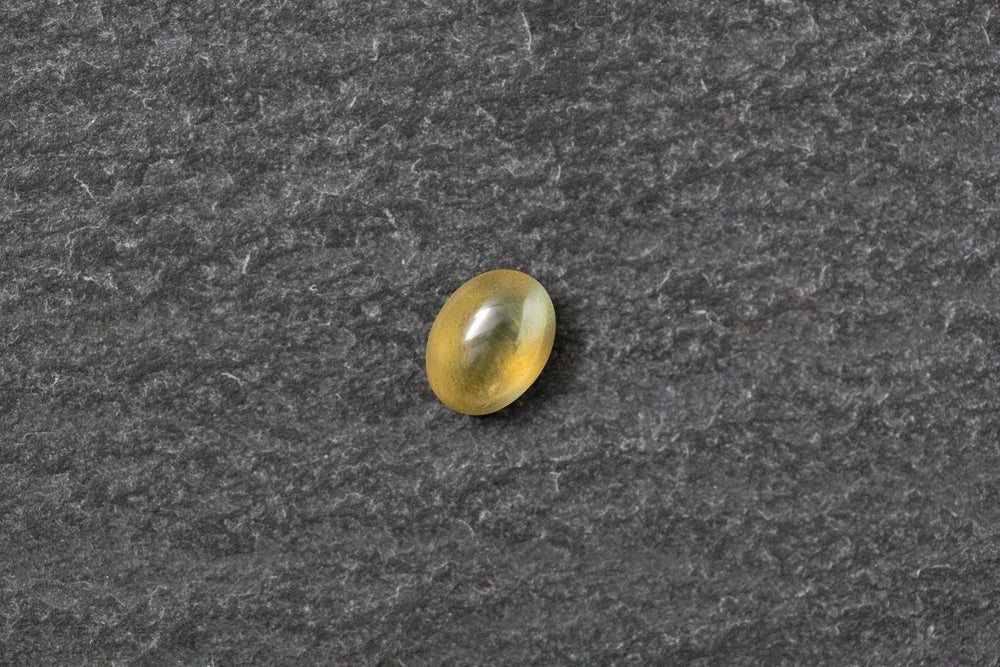 Beryll Katzenauge, oval, cabochon, gelb