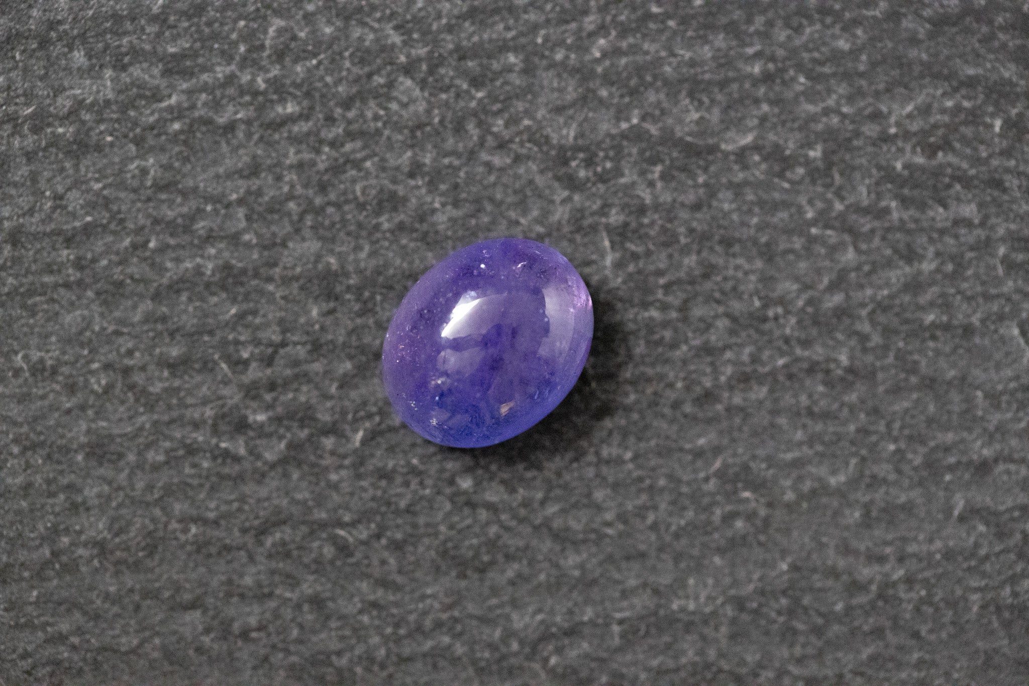 Tansanit, oval, cabochon, blau, violett
