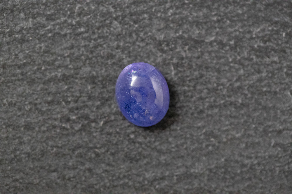 Tansanit, oval, cabochon, blau, violett