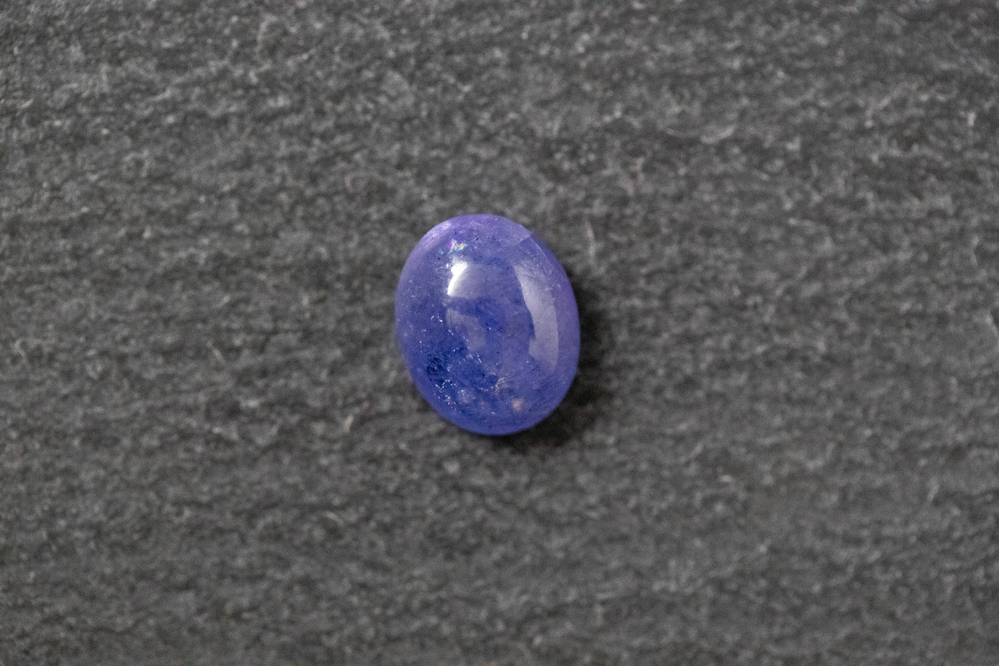 Tansanit, oval, cabochon, blau, violett
