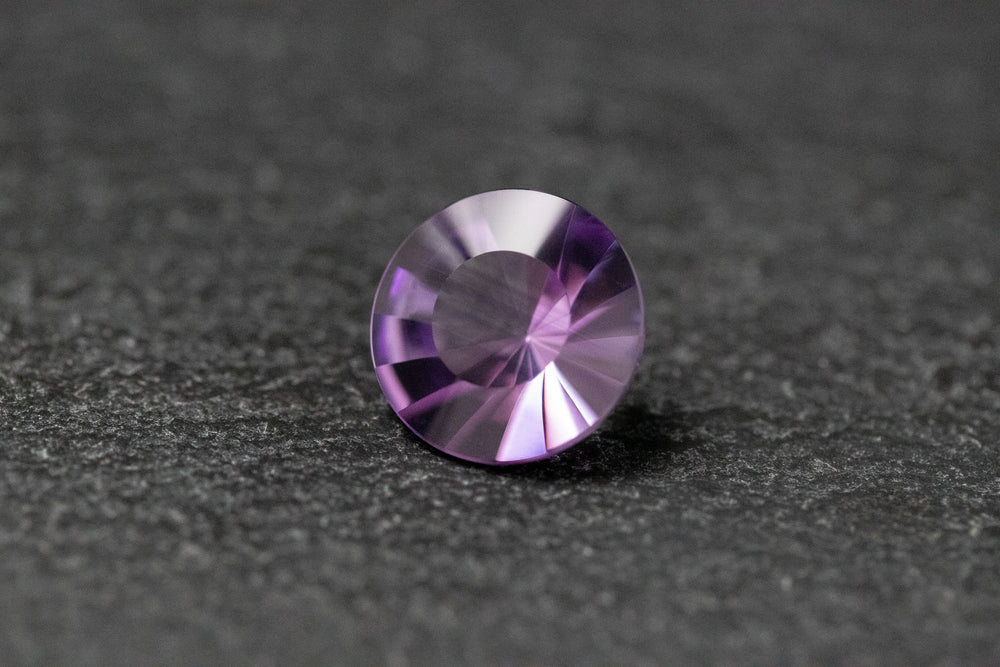 Amethyst, rund, Spiegelschliff