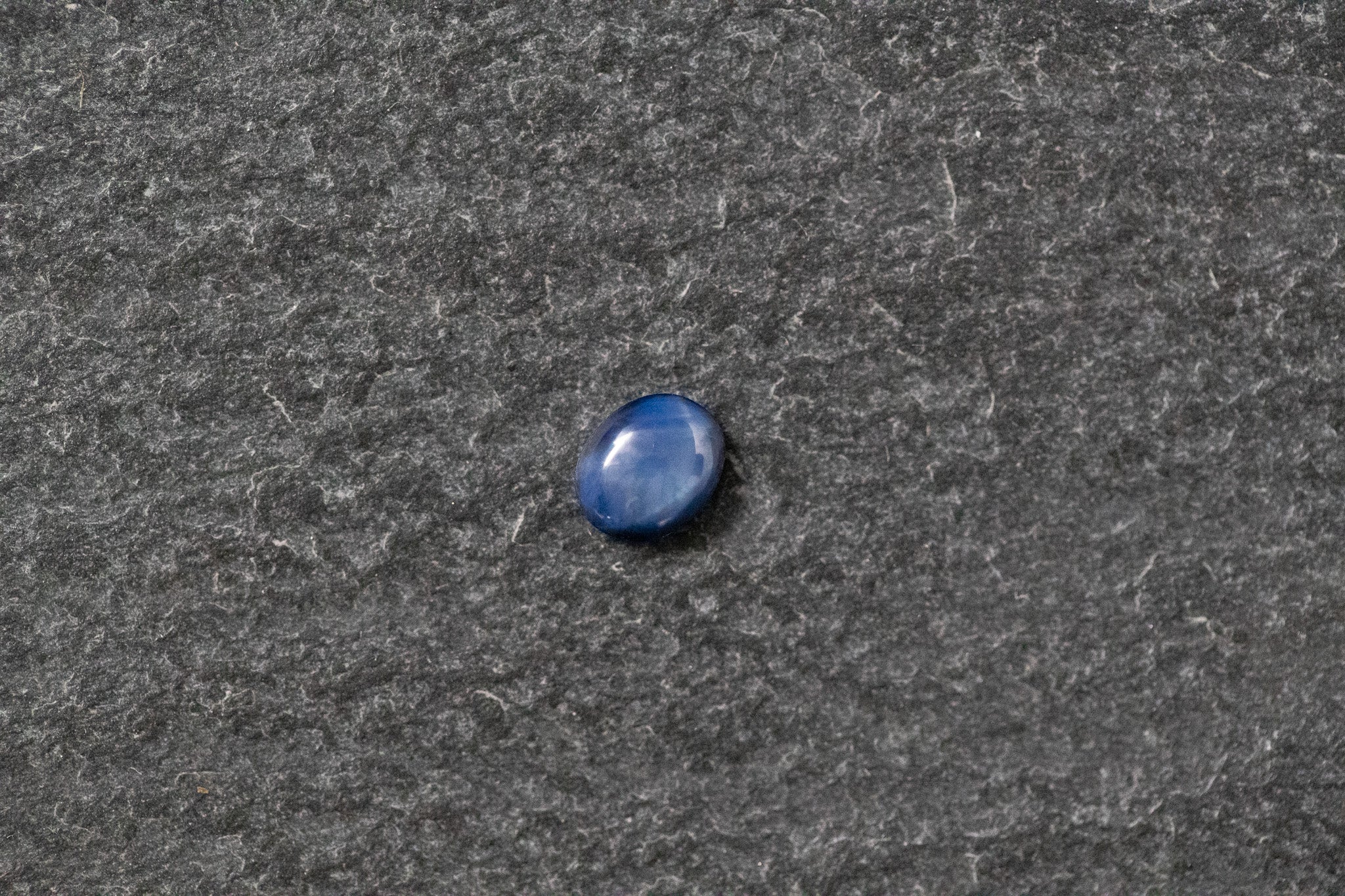 Sternsaphir oval, cabochon, blau