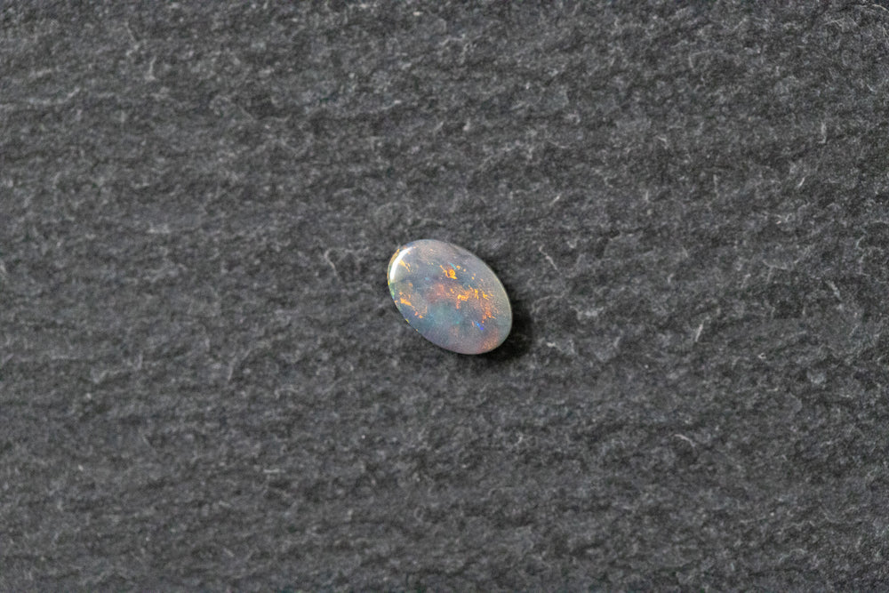 Opaldoublette, oval, blau, rot, grün