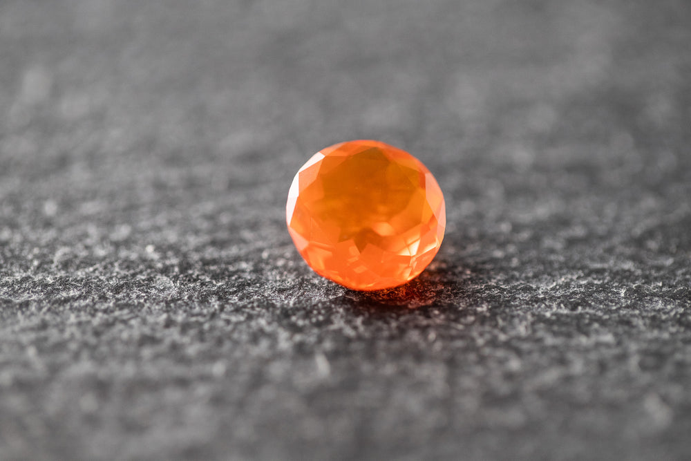 Feueropal, rund, facettiert