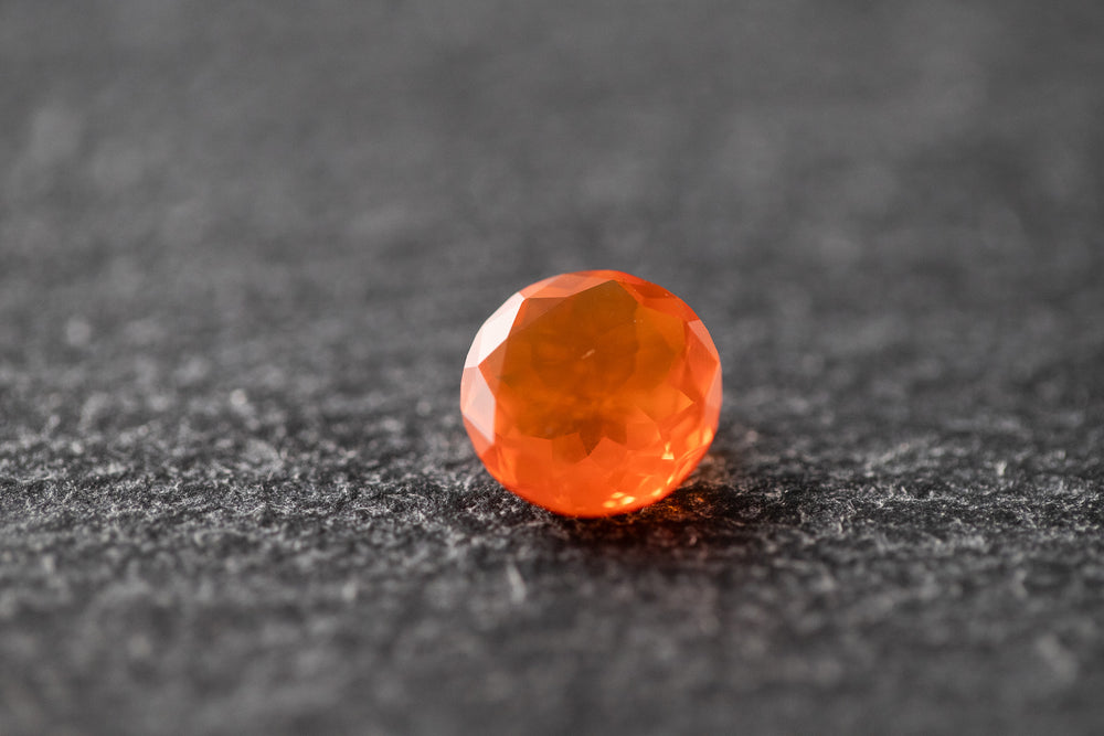 Feueropal, rund, facettiert